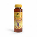 Bottle of lavender infused honey with a yellow cap on a beige background