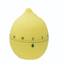 Yellow lemon-shaped kitchen timer on a white background