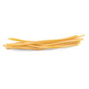 Yellow caserecce pasta strands on a white background