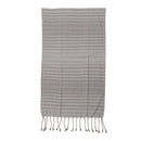 Striped towel with fringes on a white background