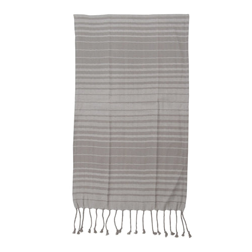 Striped towel with fringes on a white background