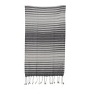 Striped towel with fringes on a white background