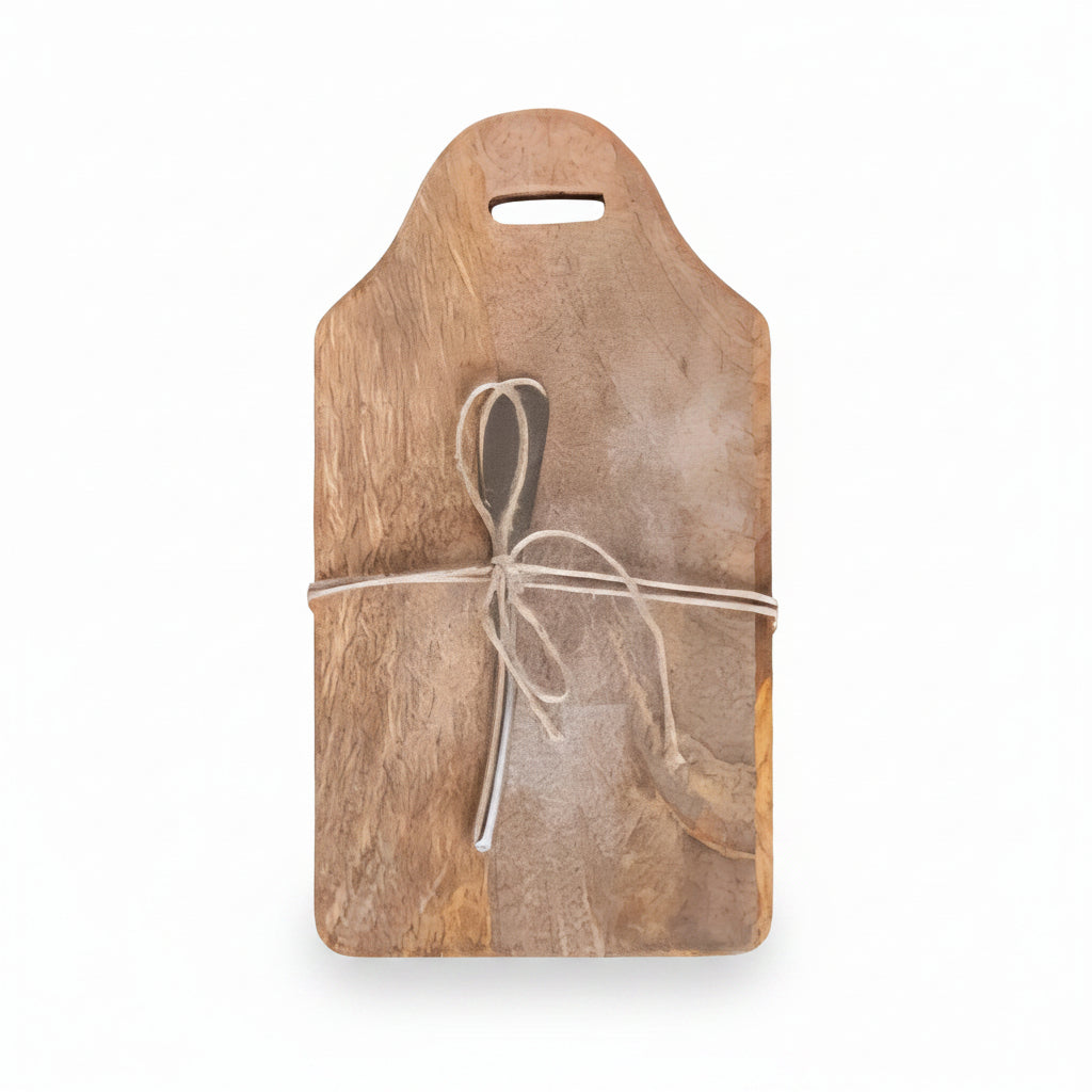 Mango cutting board with a canape knife tied together on a white background