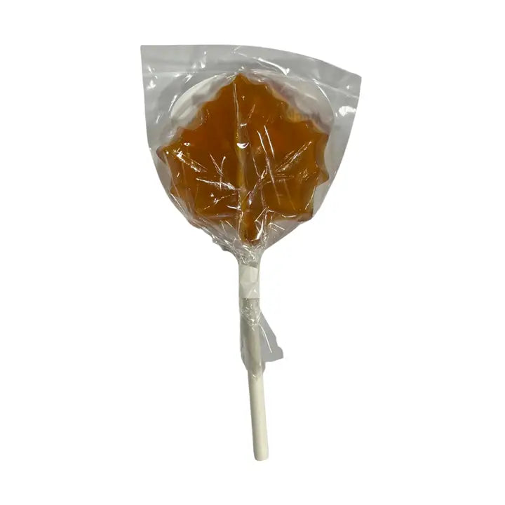 Maple syrup sucker in a clear plastic package on a white background