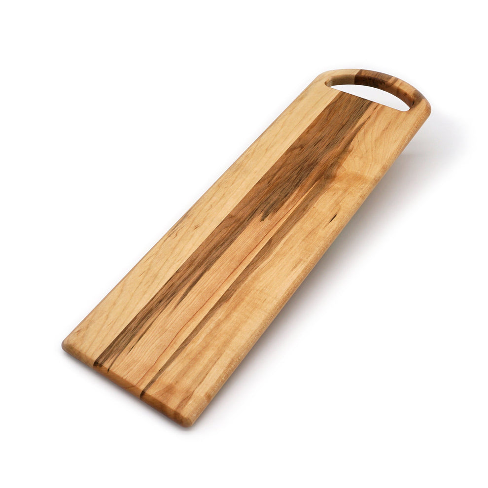 Wooden serving board with handle on a white background