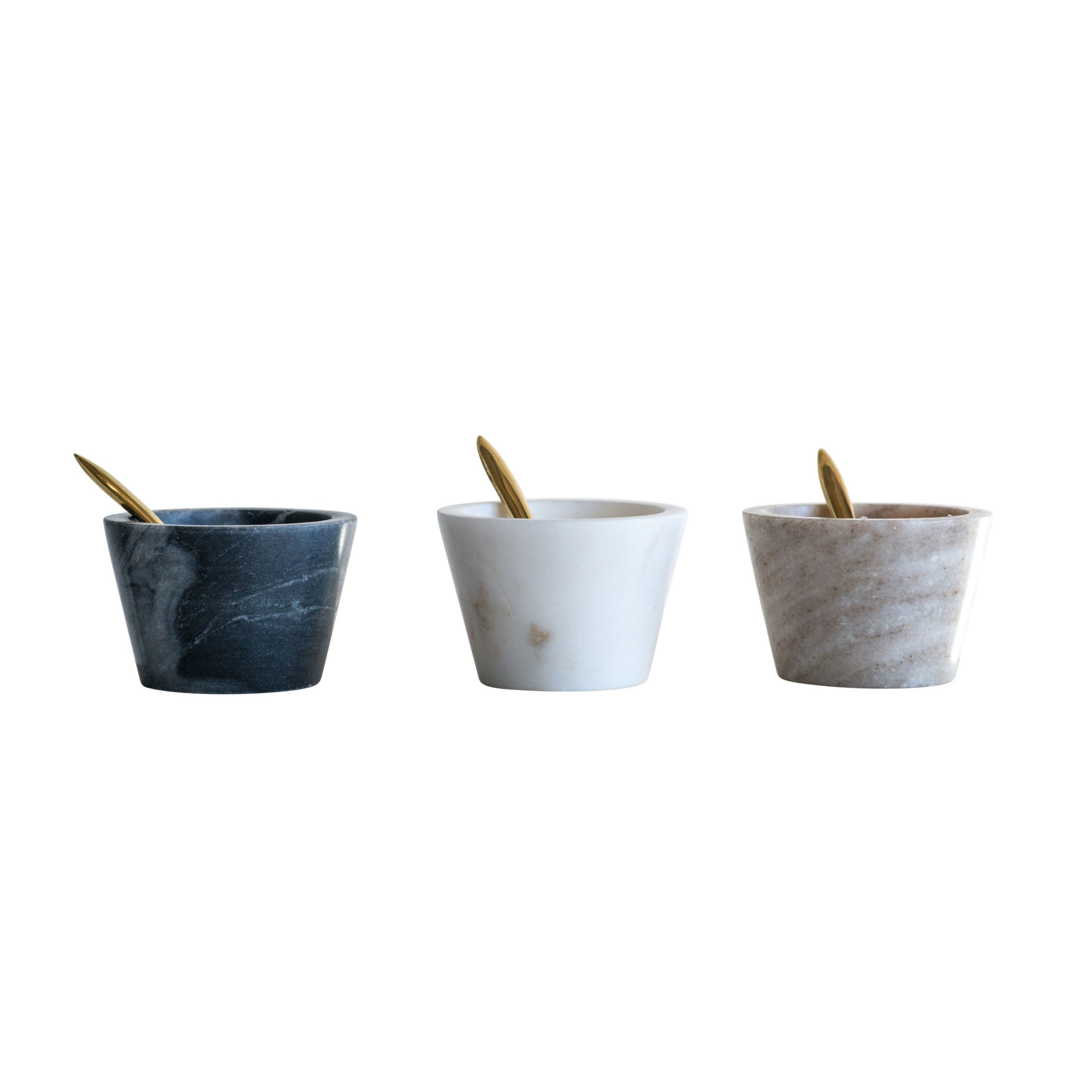 Three marble bowls with spoons on a white background.