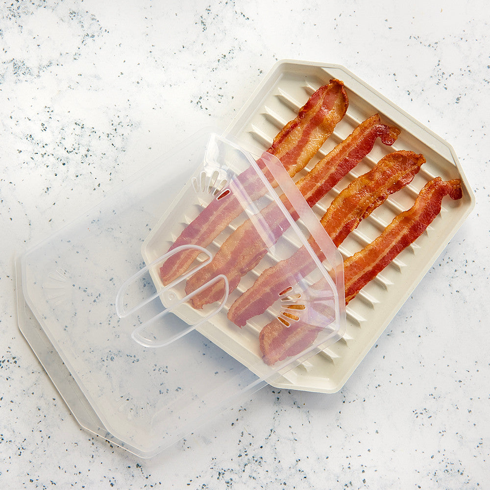 Bacon slices in a clear plastic container on a speckled countertop