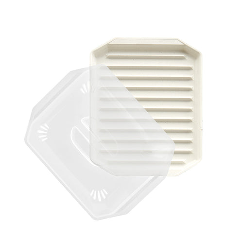 Top down look at a bacon rack with lid on a white background.