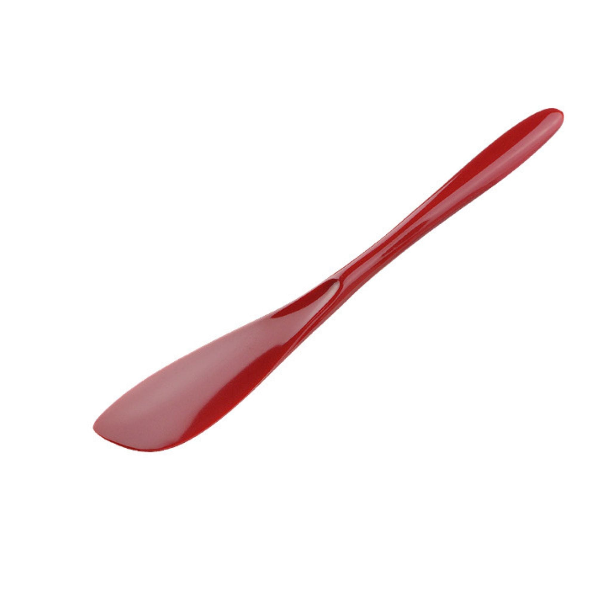 Red spreader on a white background