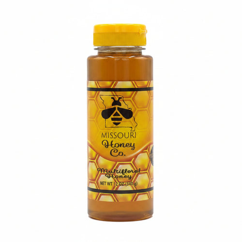 Bottle of Missouri Honey Co. honey on a white background