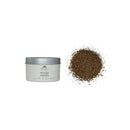 A small open container of Finch & Fennel Seasoning with Mocha-Vanilla Sea Salt, accompanied by a pile of brown sea salt outside the container.