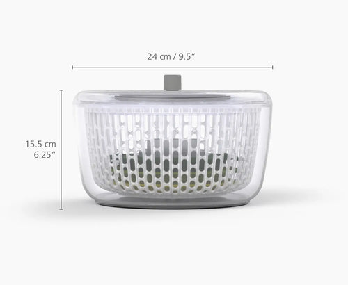 Clear salad spinner with dimensions labeled on a white background