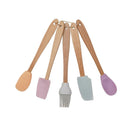 A set of kitchen utensils with silicone heads in multiple colors and beech wood handles.