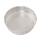 A 9 inch round cake pan made of aluminum with galvanized steel rims.