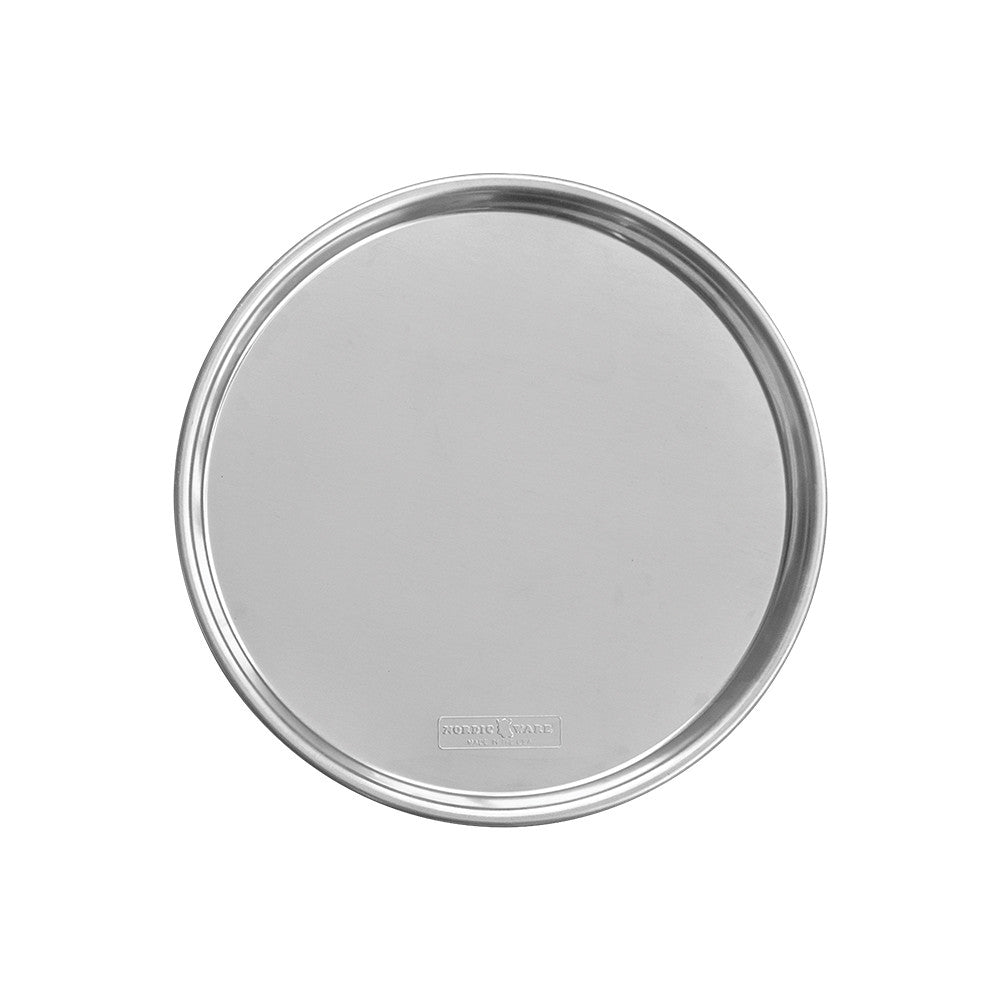 A round pizza pan with a polished rim, photographed from directly above on a solid white background.