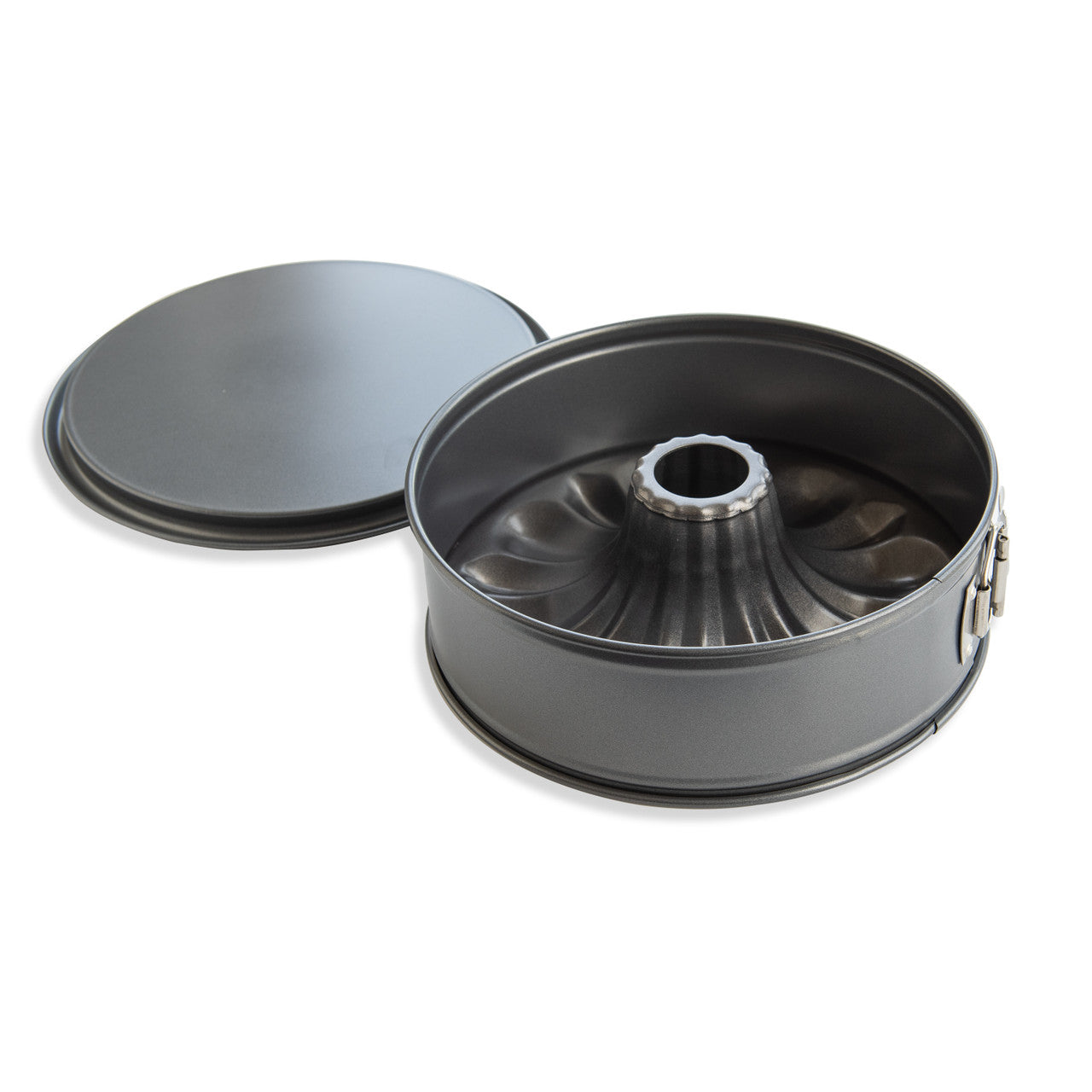 Metal bundt cake pan on a white background
