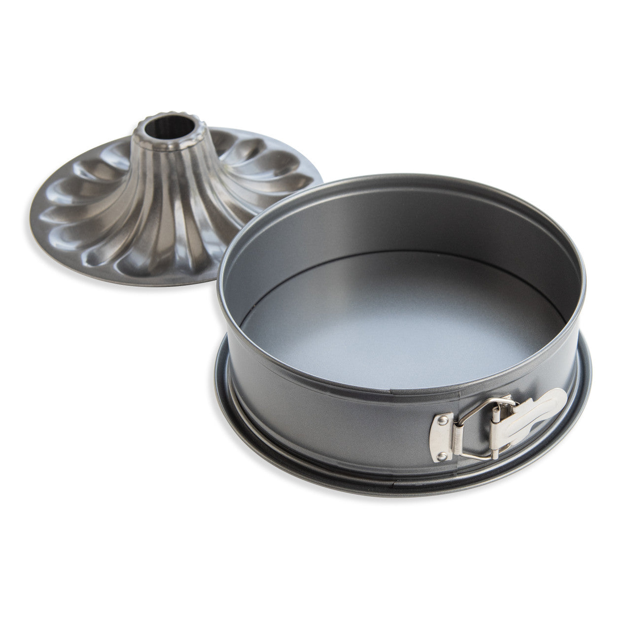 Metal cake pan with a removable bottom on a white background