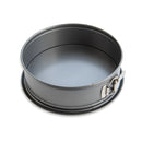 Metal springform pan on a white background