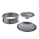 A three-piece metal springform pan set on a plain white background, including a round metal springform pan with a latch, a matching round metal lid, and a round metal fluted pan insert.