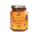 A jar of Honeysuckle Acres Original Creamed Honey with a yellow label, set against a plain white background.
