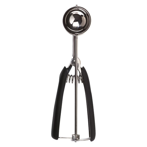 Metallic cookie scoop on a white background