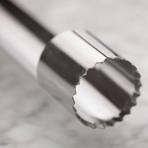 Close-up of a apple corer with a blurred background