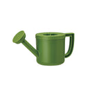Green plastic watering can shaped juicer with a spout and handle.