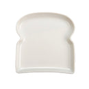 A white porcelain toast plate designed to look like the shape of a toast slice.