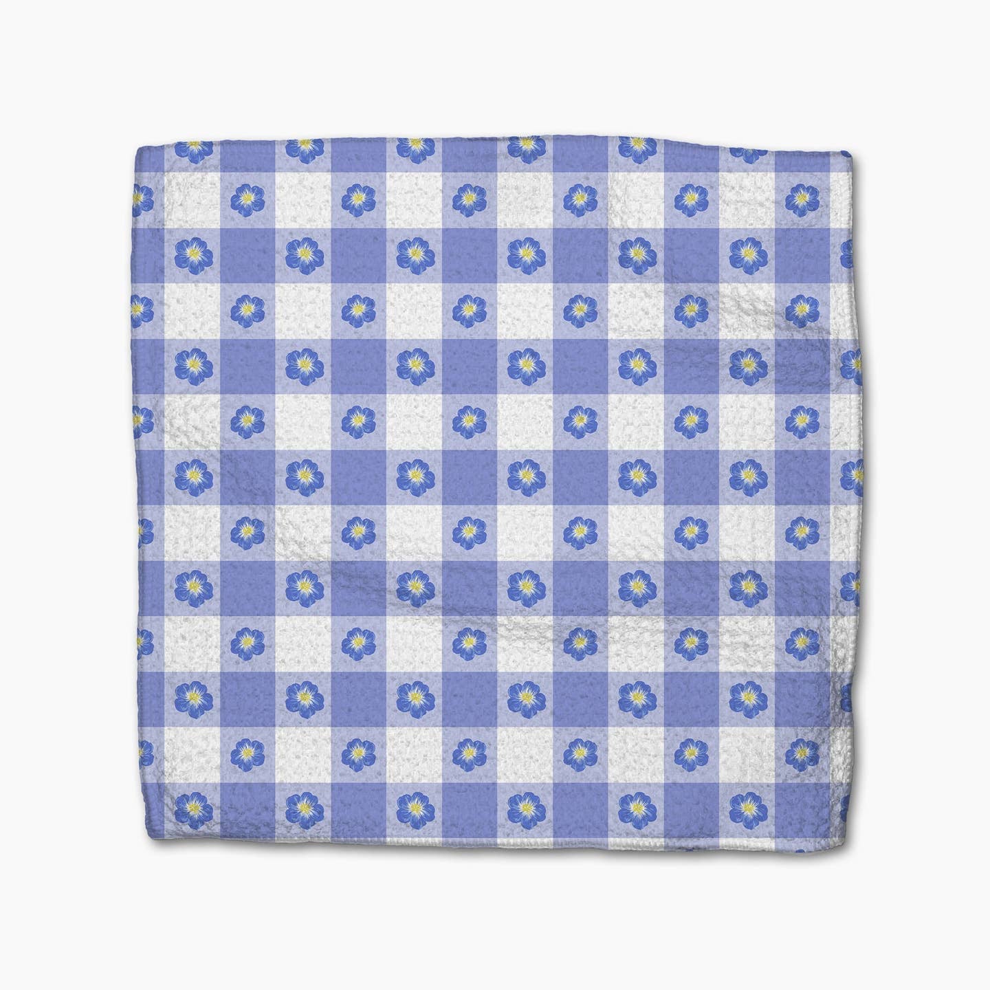 Blue and white checkered dish cloth with flower pattern on a white background