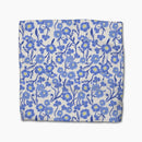 Dish cloth with blue floral pattern on a white background