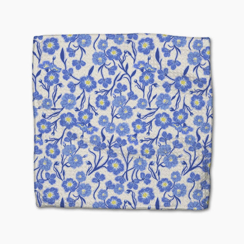 Dish cloth with blue floral pattern on a white background