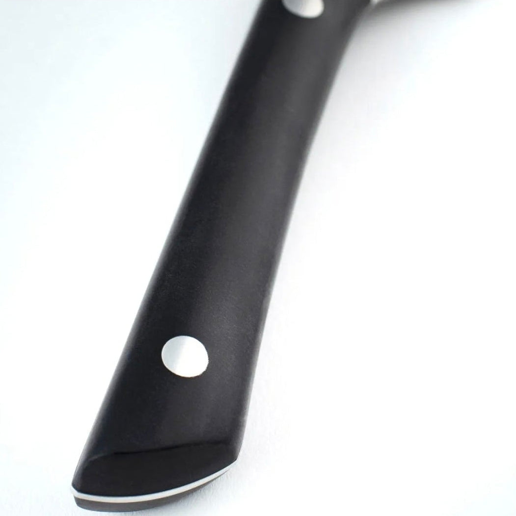 Close-up of a black kitchen knife handle with silver rivets on a white background.