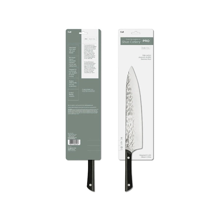 A kitchen knife shown in its retail packaging, with the knife partially visible through a clear window next to the box.