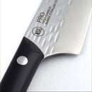 A close-up of a kitchen knife with a textured silver stainless steel blade and a black handle, featuring the NSE PRO logo and AUSM stainless steel text on the blade.