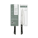 A kitchen knife shown front and back in its retail packaging on a white background. 