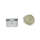 A jar of Provençal Herb Sea Salt with the label visible, displaying fine white granular substance outside the jar.
