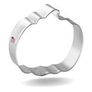 Silver pumpkin-shaped cookie cutter on a white background