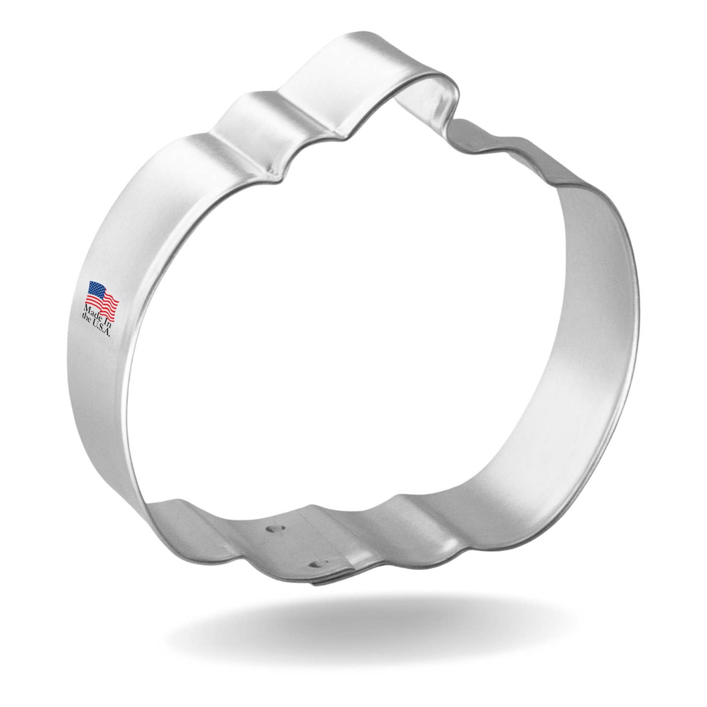Silver pumpkin-shaped cookie cutter on a white background