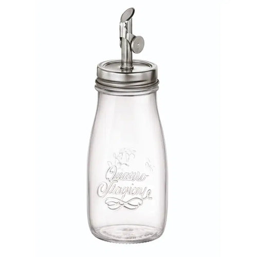A clear glass oil bottle with a silver Genietti lid, labeled 'Quattro Stagioni' and designed for kitchen use.