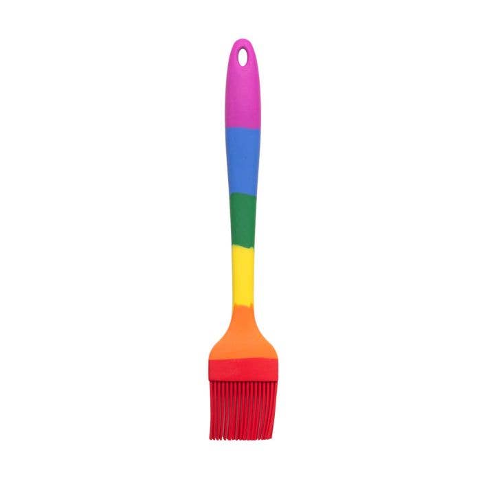Colorful rainbow silicone brush with a white background