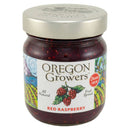Jar of Oregon Growers red raspberry fruit spread on a white background