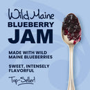 Spoonful of Wild Maine Blueberry Jam with promotional text on a blue background