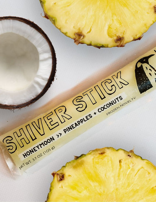 Shiver Stick frozen novelty treat packaging with pineapple and coconut on a white background