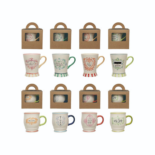 Set of ceramic mugs with various designs in boxes on a white background