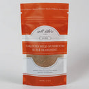 Packaging of Salt Sisters Garlicky Wild Mushroom Rub & Seasoning Mix, showing the product name and a visible sample of the seasoning mix through the clear window.