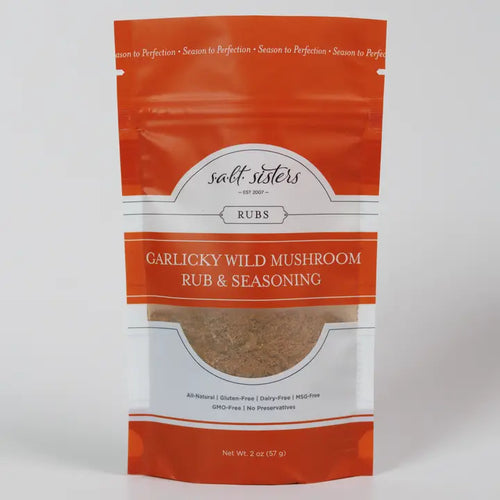 Packaging of Salt Sisters Garlicky Wild Mushroom Rub & Seasoning Mix, showing the product name and a visible sample of the seasoning mix through the clear window.
