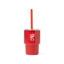Red tumbler with a straw and 'Festive Fuel' text on a white background
