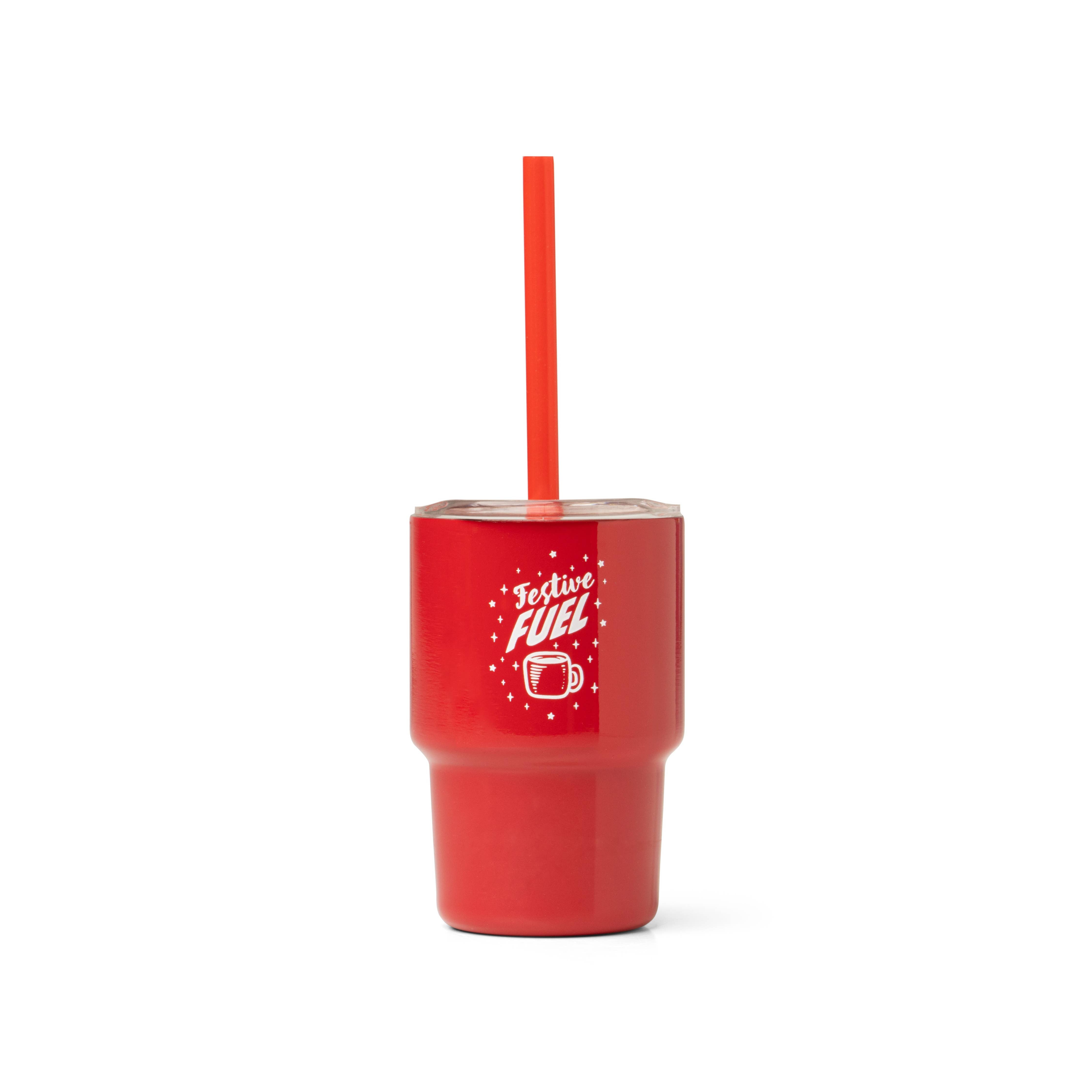Red tumbler with a straw and 'Festive Fuel' text on a white background
