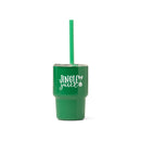Green tumbler with 'Jingle Juice' text and a straw on a white background