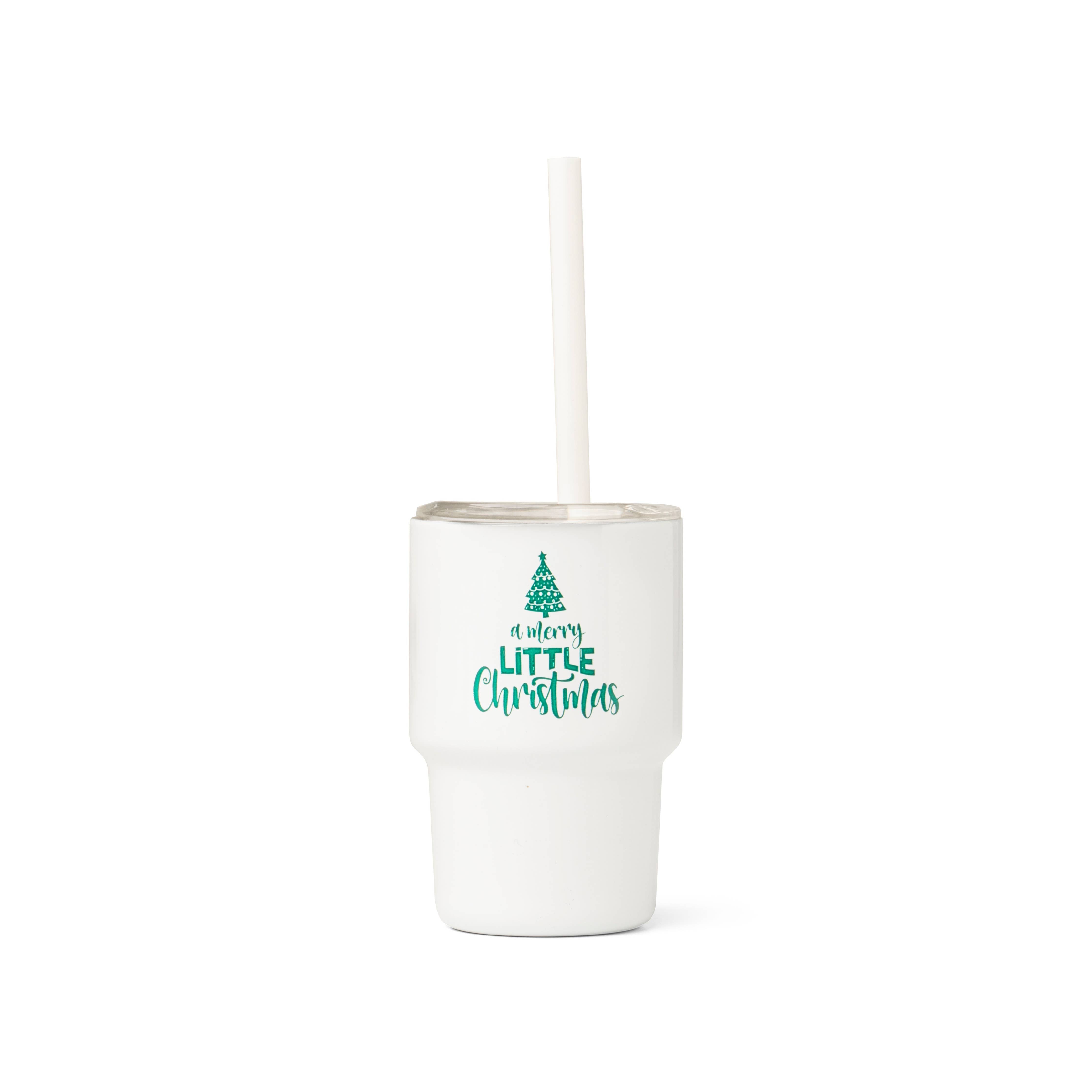 White tumbler with 'a very little Christmas' text and a tree design on a white background
